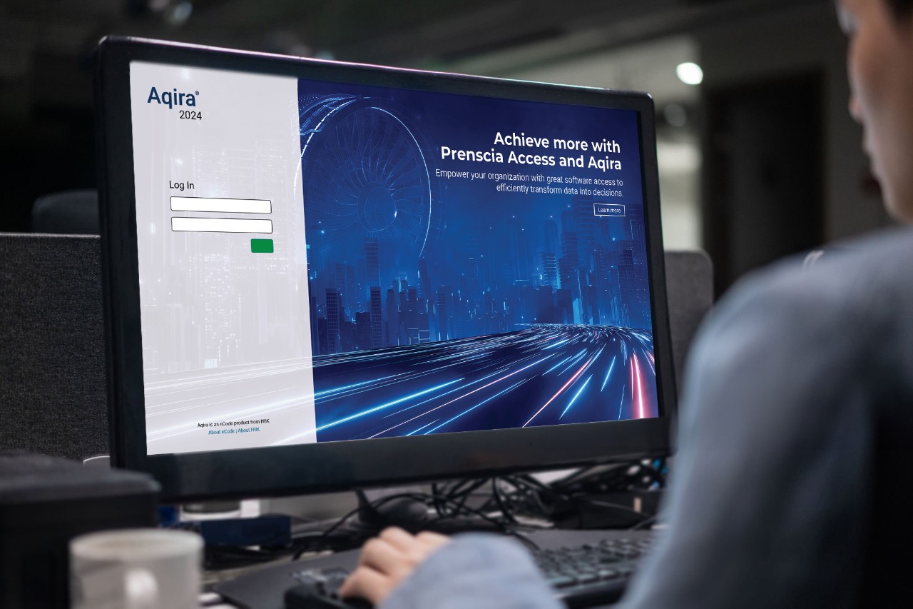 asian young businessman working on computer with business report